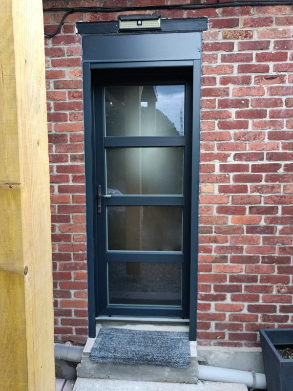 Porte d'entrée PVC couleur 4 vitrages anthracite